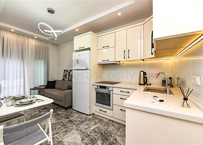 Двухкомнатная квартира с выходом в сад в центре Аланьи