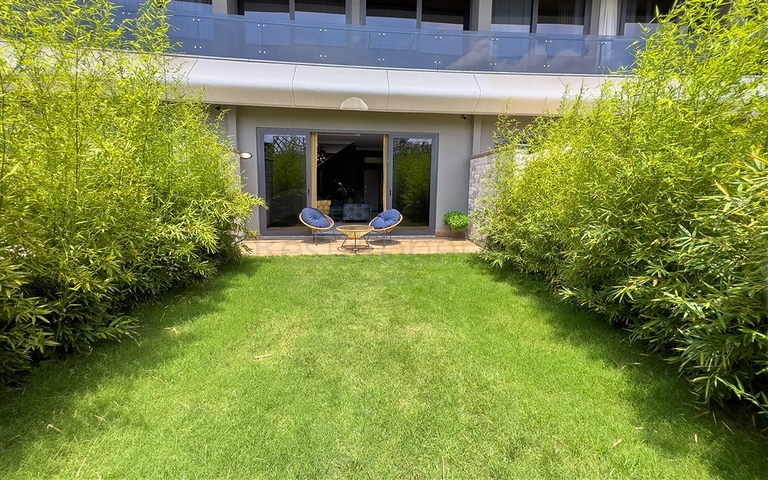 Садовый дуплекс 2+1 на первой береговой линии в Каргыджаке