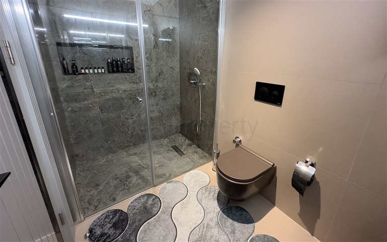 Садовый дуплекс 2+1 на первой береговой линии в Каргыджаке