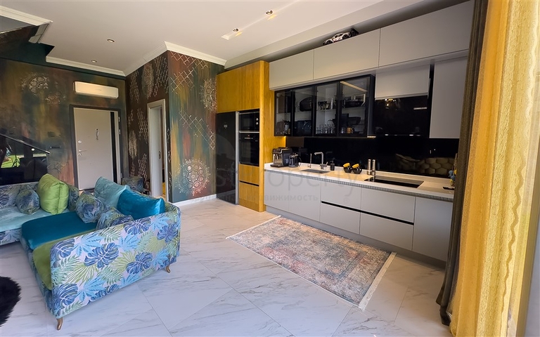 Садовый дуплекс 2+1 на первой береговой линии в Каргыджаке