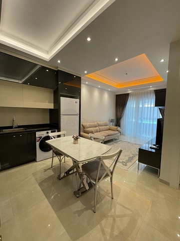 Двухкомнатная меблированная квартира в новом комплексе Махмутлара