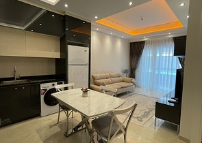 Двухкомнатная меблированная квартира в новом комплексе Махмутлара