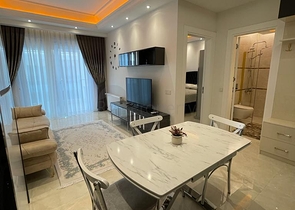 Двухкомнатная меблированная квартира в новом комплексе Махмутлара