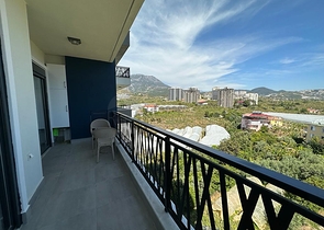 Квартира 1+1 с видом на горы в современном комплексе