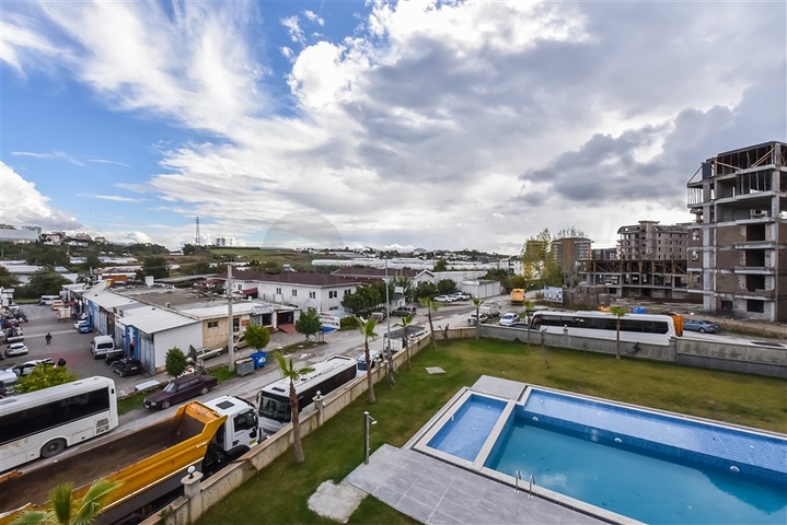 Двухкомнатная квартира в новом доме в районе Авсаллар