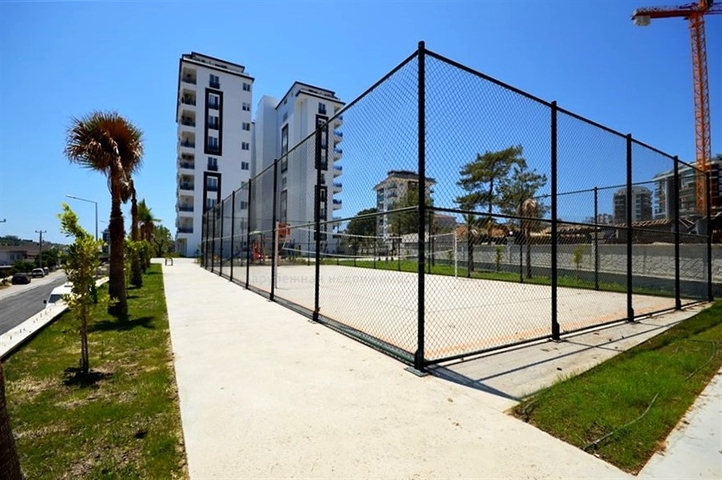 Двухкомнатная квартира в новом доме в районе Авсаллар