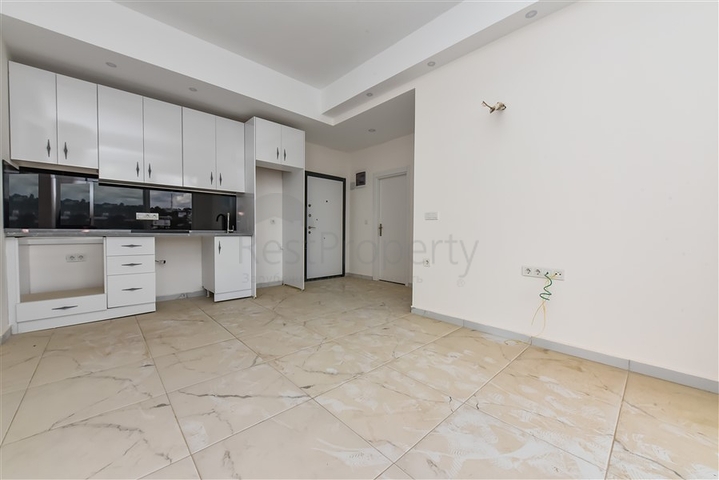 Двухкомнатная квартира в новом доме в районе Авсаллар