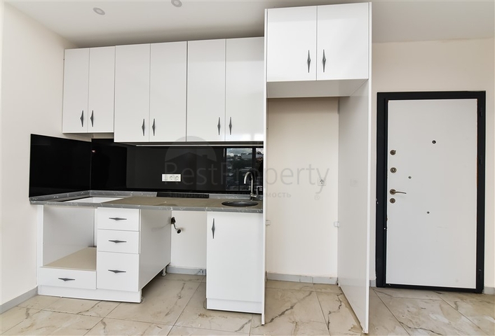 Двухкомнатная квартира в новом доме в районе Авсаллар