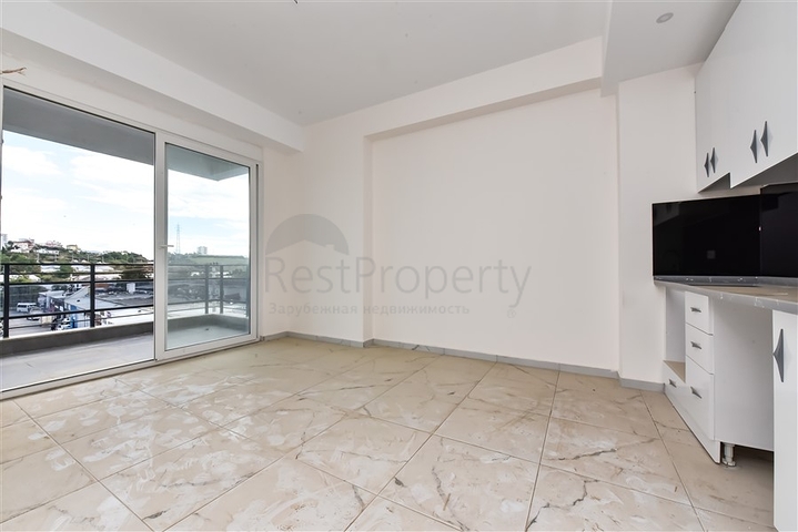 Двухкомнатная квартира в новом доме в районе Авсаллар