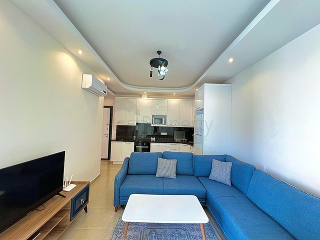 Квартира 1+1 в районе Махмутлар с мебелью и техникой. 