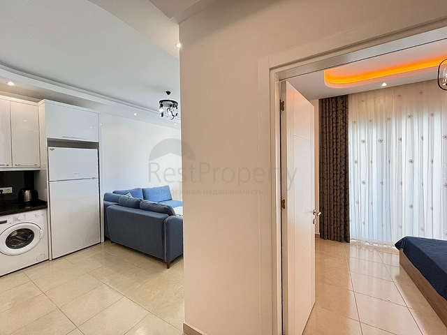 Квартира 1+1 в районе Махмутлар с мебелью и техникой. 