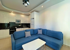 Квартира 1+1 в районе Махмутлар с мебелью и техникой. 