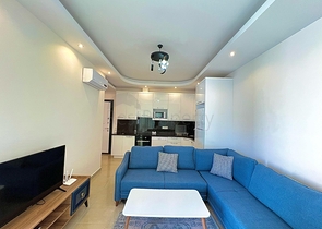 Квартира 1+1 в районе Махмутлар с мебелью и техникой. 