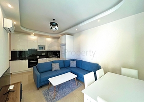 Квартира 1+1 в районе Махмутлар с мебелью и техникой. 