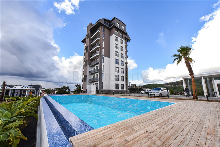 Новая квартира 2+1 в зеленом районе Авсаллар