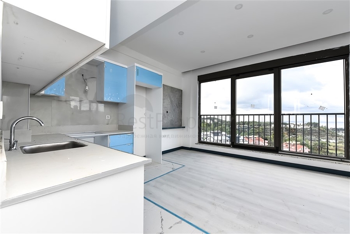 Новая квартира 2+1 в зеленом районе Авсаллар