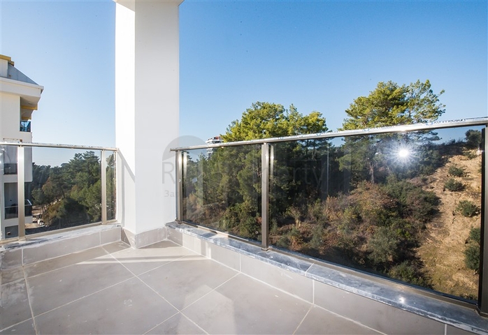 Квартира 1+1 в новом комплексе в окружении хвойного леса