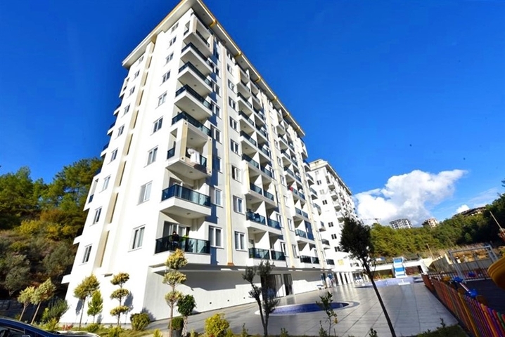 Квартира 1+1 в новом комплексе в окружении хвойного леса