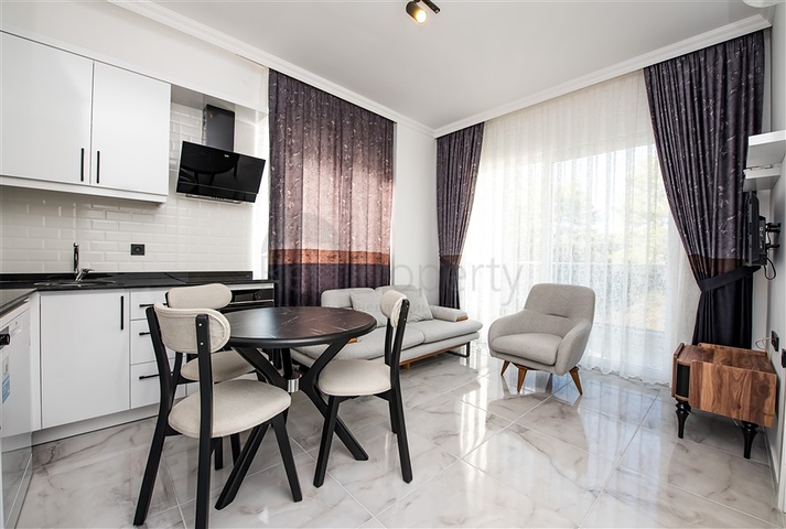 Квартира 1+1 в новом комплексе в окружении хвойного леса