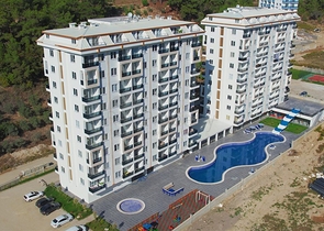 Квартира 1+1 в новом комплексе в окружении хвойного леса