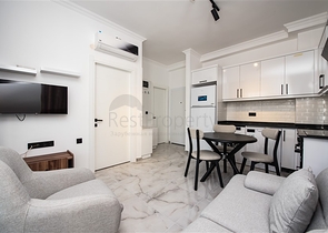 Квартира 1+1 в новом комплексе в окружении хвойного леса