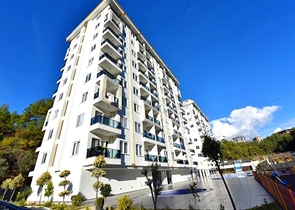 Квартира 1+1 в новом комплексе в окружении хвойного леса