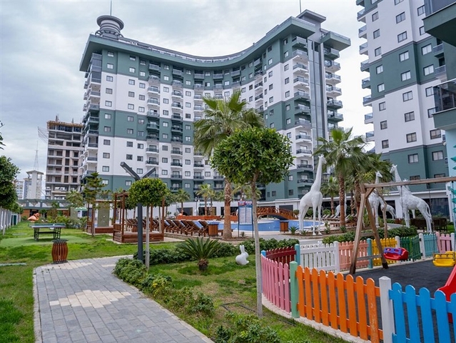 Квартира 1+1 в популярном жилом комплексе в районе Махмутлар