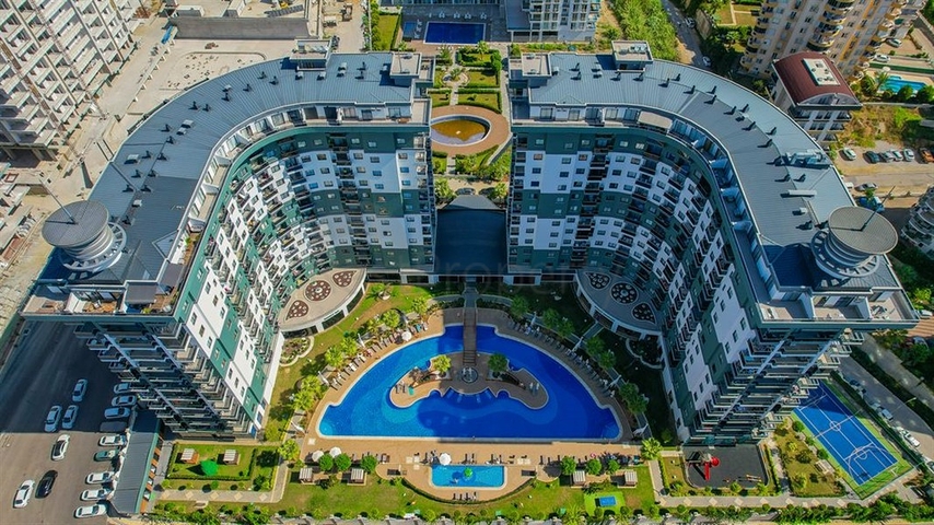 Квартира 1+1 в популярном жилом комплексе в районе Махмутлар