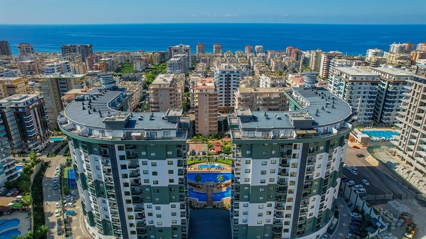 Квартира 1+1 в популярном жилом комплексе в районе Махмутлар