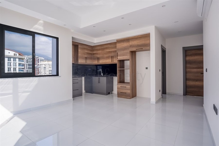 Квартира 1+1 в популярном жилом комплексе в районе Махмутлар