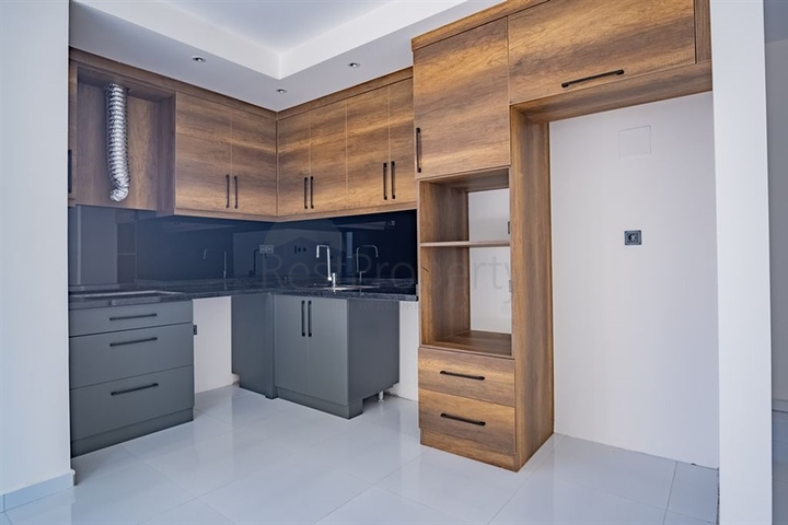 Квартира 1+1 в популярном жилом комплексе в районе Махмутлар