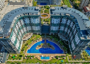 Квартира 1+1 в популярном жилом комплексе в районе Махмутлар