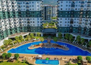 Квартира 1+1 в популярном жилом комплексе в районе Махмутлар