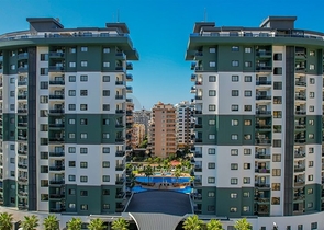 Квартира 1+1 в популярном жилом комплексе в районе Махмутлар