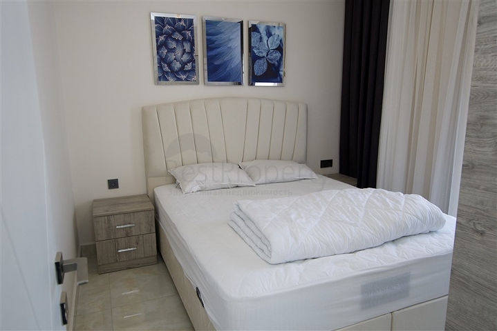 Квартира планировкой 1+1 в районе Махмутлар