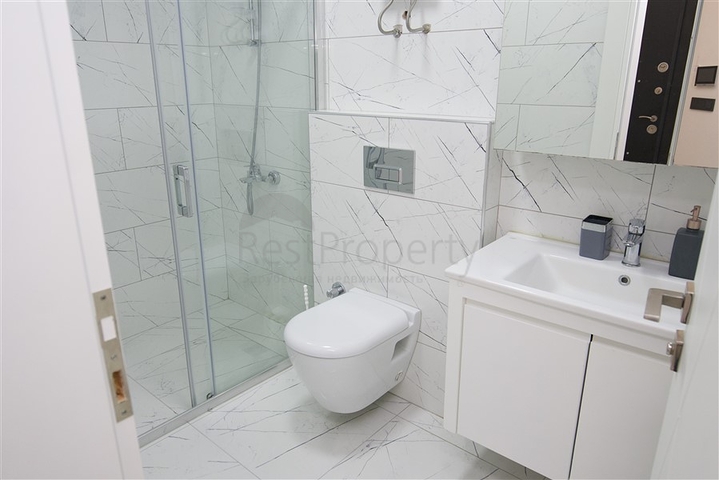 Квартира планировкой 1+1 в районе Махмутлар