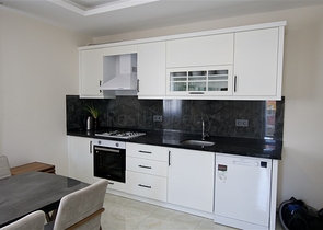 Квартира планировкой 1+1 в районе Махмутлар