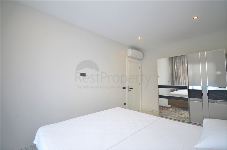 Двухкомнатная квартира в живописном районе Алании и пешей доступности к морю