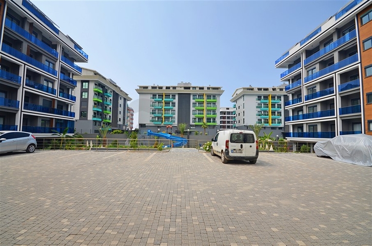 Двухкомнатная квартира в живописном районе Алании и пешей доступности к морю