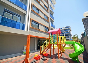 Двухкомнатная квартира в живописном районе Алании и пешей доступности к морю