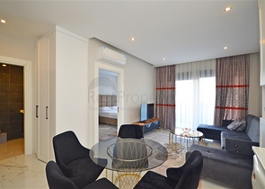 Двухкомнатная квартира в живописном районе Алании и пешей доступности к морю