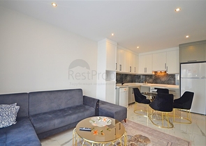 Двухкомнатная квартира в живописном районе Алании и пешей доступности к морю