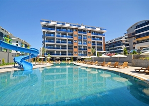 Двухкомнатная квартира в живописном районе Алании и пешей доступности к морю