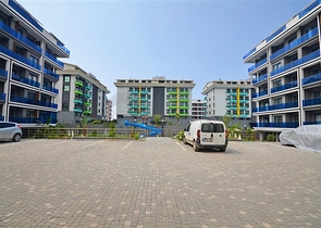 Двухкомнатная квартира в живописном районе Алании и пешей доступности к морю