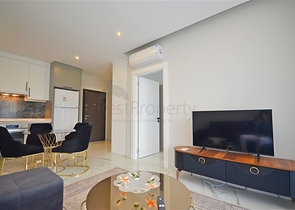 Двухкомнатная квартира в живописном районе Алании и пешей доступности к морю