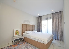 Двухкомнатная квартира в живописном районе Алании и пешей доступности к морю