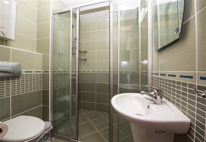 Просторная квартира 2+1 с видом на море в районе Махмутлар