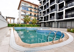 Квартира планировкой 1+1 в 100м от Средиземного моря в районе Кестель Квартира планировкой 1+1 в 100м от Средиземного моря в районе Кестель