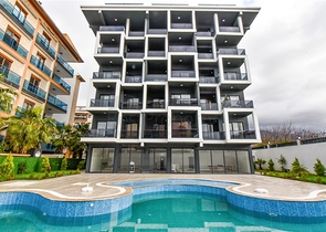 Квартира планировкой 1+1 в 100м от Средиземного моря в районе Кестель Квартира планировкой 1+1 в 100м от Средиземного моря в районе Кестель