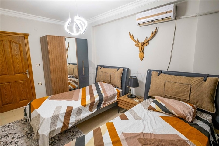 Квартира 2+1 на первой линии в районе Махмутлар